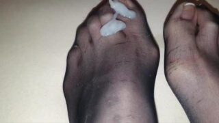 My sexy stockinged feet and toes getting sprayed by a cumshot Thumbnail